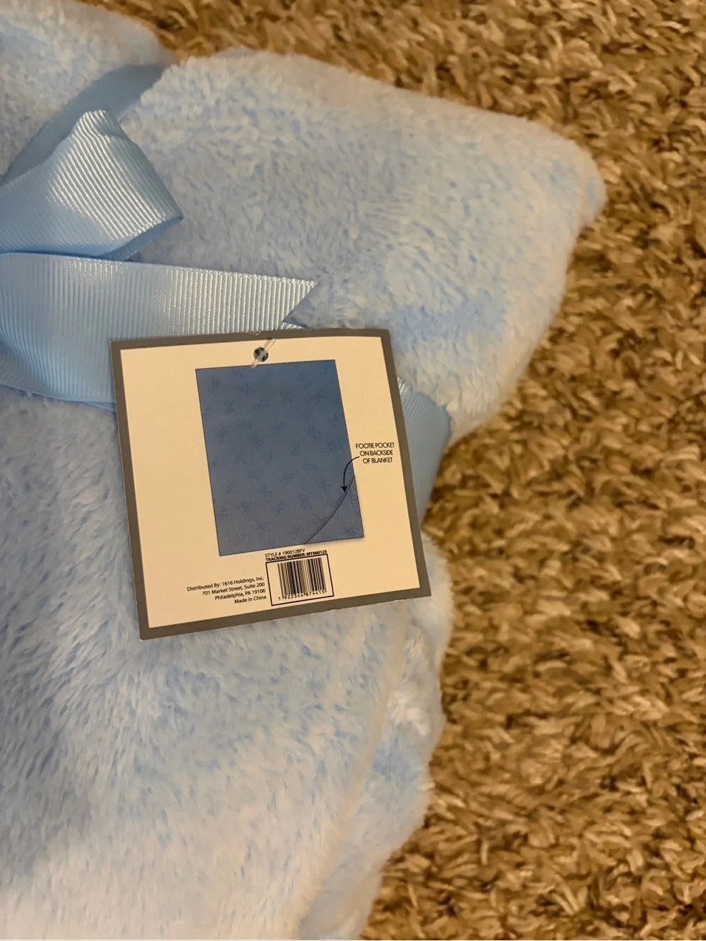 Light Blue Plush Throw Blanket with Bow Pattern